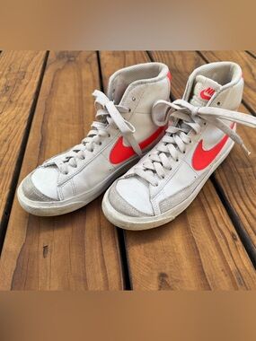 Nike High-Top Sneakers in Cream with Neon Orange Swoosh